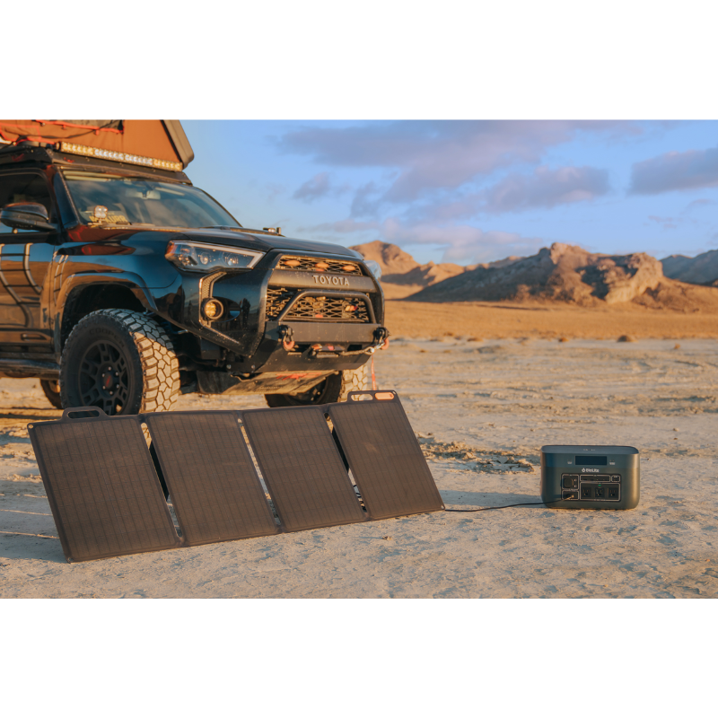 BaseCharge 1500 in the desert being charged by a solar panel. 