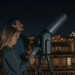 Couple using Unistellar eQuinox 2 Smart Telescope.