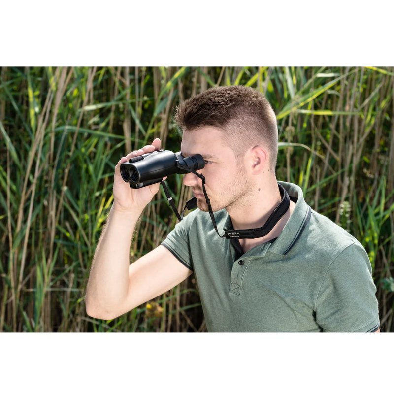 Image of a man using Vixen ATERA H12x30 Image Stabilized Binoculars.