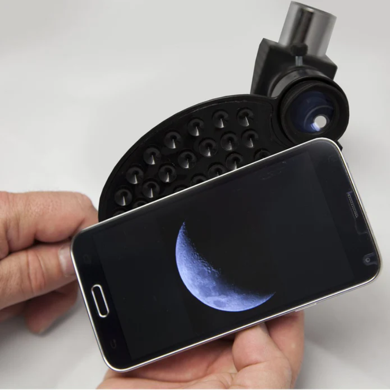 National Geographic CF700SM 70mm Refractor Telescope phone adapter with a smartphone attached.