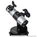 Starsense Explorer 114mm Smartphone App-Enabled Tabletop Dobsonian Telescope slightly facing left and pointed up.