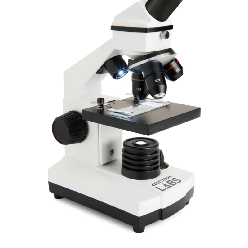 Zoomed in image of Celestron Labs CM800 Compound Microscope slightly facing right.